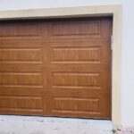 Solid (no glass) / 1-car garage doors Clopay Classic Steel Premium Series - Model 4310 - Ultra-Grain Cypress Medium - Elegant Long Design