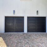 Solid (no glass) / 1-car garage doors Clopay Classic Steel Premium Series Model 4310 Black Long Elegant Design