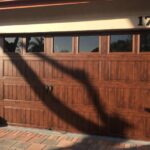 Top-Glass / 2-car garage doors Clopay Gallery® Steel - Premium Series w/ Short Windows- Model GD2LP -Ultra-Grain® Oak Walnut Finish