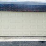 Solid (No glass) / 2-car garage doors Clopay Classic Steel Premium Series Model 4300 Almond Elegant Short Design