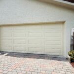 Solid (No glass) / 2-car garage doors Clopay Classic Steel Premium Series Model 4310 Almond Long Elegant Design