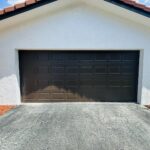 Solid (No glass) / 2-car garage doors Clopay Classic Steel Value Series Model 94 Chocolate Traditional Short Design