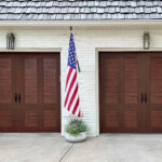 Solid (no glass) / 1-car garage doors Clopay Canyon Ridge® Carriage House 4-Layer - Design 32 - Pecky Cypress Walnut
