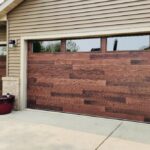 Top-Glass / 2-car garage doors Clopay Modern Steel™ with Contemporary Windows - Premium Series with Intellicore® w/ Plain Long Windows - Model 9208 - Ultra-Grain® Kona Plank Finish