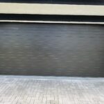 Solid (No glass) / 2-car garage doors Clopay Modern Steel Premium Series Model 4305 Mocha Brown Modern Grooved Design