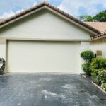 Solid (No glass) / 2-car garage doors Clopay Modern Steel Value Series Model 4F Almond