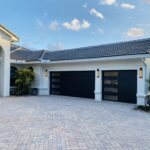 Side-Glass / 2/Car garage doors Clopay Modern Steel™ with Contemporary Windows - Premium Series with Intellicore® - Black - SL,SL,SL,GL