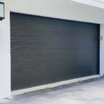 Solid (No glass) / 2-car garage doors Clopay Modern Steel Premium Series Model 4302 Mocha Brown Modern Flush Design