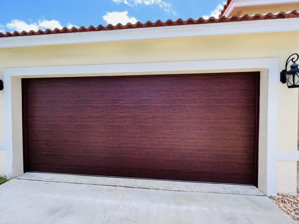 Clopay Modern Steel™ with Contemporary Windows - Premium Series with Intellicore® - Model 4302 - Ultra-Grain Cypress Cherry - Modern Flush Design