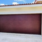 Clopay Modern Steel™ with Contemporary Windows - Premium Series with Intellicore® - Model 4302 - Ultra-Grain Cypress Cherry - Modern Flush Design