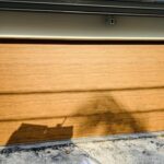 Solid (No glass) / 2-car garage doors Clopay Modern Steel Premium Series Model 4305 Ultra-Grain Cypress Medium Modern Grooved Design