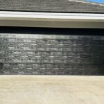 Solid (No glass) / 2-car garage doors Clopay Modern Steel Premium Series Model 4302 Ultra-Grain Cypress Slate Modern Flush Design