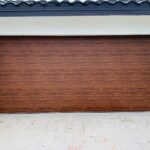 Solid (No glass) / 2-car garage doors Clopay Modern Steel Premium Series Model 4302 / 9208 Ultra-Grain Cypress Walnut Modern Flush Design