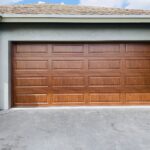 Solid (No glass) / 2-car garage doors Clopay Classic Steel Premium Series Model 4310 Ultra-Grain Cypress Medium Elegant Long Design