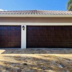 Solid (No glass) / 2-car garage doors Clopay Gallery Premium Series Model GD2LU - Ultra-Grain Oak Walnut