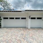 Top-Glass / 2-car garage doors Clopay Modern Steel™ with Contemporary Windows - Premium Series with Intellicore® w/ Plain Long Windows - Model 9209 - Standard White