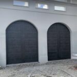 Solid (no glass) / 1-car garage doors Clopay Canyon Ridge® Carriage House 4-Layer - Design 31 - Pecky Cypress Slate