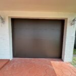 Solid (no glass) / 1-car garage doors Clopay Modern Steel Premium Series with Intellicore Model 9208 Chocolate Modern Flush Design