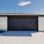 Solid (No glass) / 2-car garage doors Clopay Modern Steel Premium Series with Intellicore Model 9208 Black Modern Flush Design