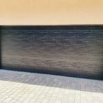 Solid (No glass) / 2-car garage doors Clopay Modern Steel Premium Series Model 4302 Black Modern Flush Design