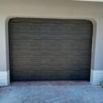 Solid (no glass) / 1-car garage doors Clopay Modern Steel Premium Series Model 4305 Ultra-Grain Cypress Slate Modern Grooved Design