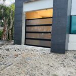 Full-view - (all glass) 2-car garage doors Full-view - Black Frame - Grey glass w/ Privacy