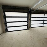 Full-view - (all glass) 2-car garage doors Full-view - Black Frame - Grey glass w/ Privacy - Interior view