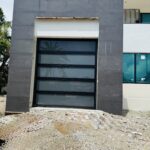 Full-view - (all glass) 2-car garage doors Full-view - Black Frame - Grey glass w/ Privacy