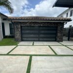 Full-view - (all glass) 2-car garage doors Full-view - Bronze frame - Grey glass w/ privacy