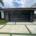 Full-view - (all glass) 2-car garage doors Full-view - Bronze frame - Grey glass w/ privacy