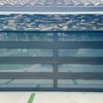 Full-view - (all glass) 2-car garage doors Full-view - Bronze frame - Grey glass w/ privacy