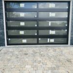 Full-view - (all glass) 2-car garage doors Eco Window Systems - Bronze frame - Bronze glass w/ privacy