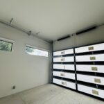 Full-view - (all glass) 2-car garage doors Eco Window Systems - Bronze frame - Bronze glass w/ privacy