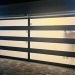 Full-view - (all glass) 2-car garage doors Eco Window Systems - Bronze frame - Grey glass w/ privacy