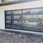 Full-view - (all glass) 2-car garage doors Eco Window Systems - Bronze frame - Clear glass w/ No privacy