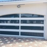 Full-view - (all glass) 2-car garage doors Eco Window Systems - White frame - Grey glass w/ privacy