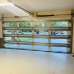 Full-view - (all glass) 2-car garage doors Clopay Modern Steel™ with Contemporary Windows - Premium Series with Intellicore® - Full-view - Mocha Brown - 1/4 Impact resistant Lexan glass