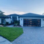 Full-view - (all glass) 2-car garage doors Clopay Modern Steel™ with Contemporary Windows - Premium Series with Intellicore® - Full-view - Mocha Brown - 1/4 Impact resistant Lexan glass