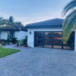 Full-view - (all glass) 2-car garage doors Clopay Modern Steel™ with Contemporary Windows - Premium Series with Intellicore® - Full-view - Mocha Brown - 1/4 Impact resistant Lexan glass