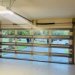 Full-view - (all glass) 2-car garage doors Clopay Modern Steel™ with Contemporary Windows - Premium Series with Intellicore® - Full-view - Mocha Brown - 1/4 Impact resistant Lexan glass