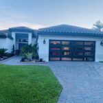 Full-view - (all glass) 2-car garage doors Clopay Modern Steel™ with Contemporary Windows - Premium Series with Intellicore® - Full-view - Mocha Brown - 1/4 Impact resistant Lexan glass