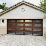 Full-view - (all glass) 2-car garage doors Clopay Modern Steel™ with Contemporary Windows - Premium Series with Intellicore® - Full-view - Ultra-Grain Cypress Walnut - Polycarbonate windows