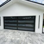 Full-view - (all glass) 2-car garage doors Full-view - Black Frame - Grey glass w/ Privacy